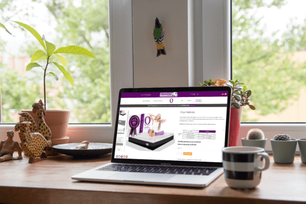 Mattress Omni Cyber Monday Sale Banner - Computer in a desk